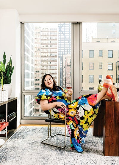 Belinda Chang kicks back in her colorful Chicago apartment