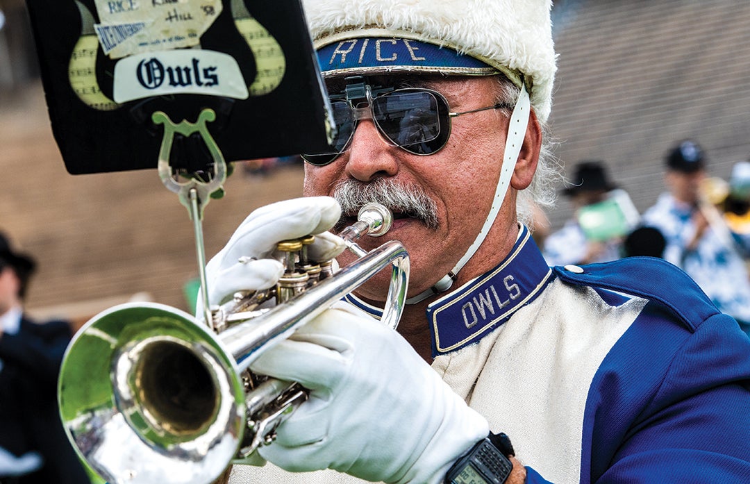 Grungy Gladu plays trumpet at Homecoming at his 50th anniversary at Rice