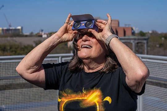 Patricia Reiff at Rice with eclipse glasses