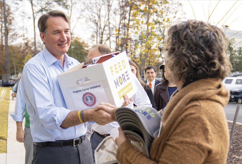 Photo of Glenn Youngkin volunteering with a nonprofit