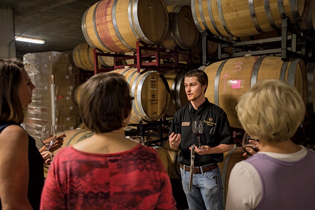 Kyle Hahne educates curious wine lovers on a tour of Pedernales Cellars. Photo by Tommy LaVergne