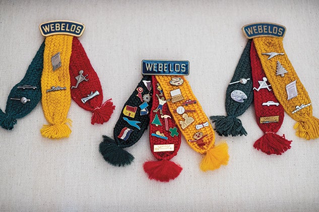 Scouting badges belonging to Spain, his husband and son. Photo by Jeff Fitlow