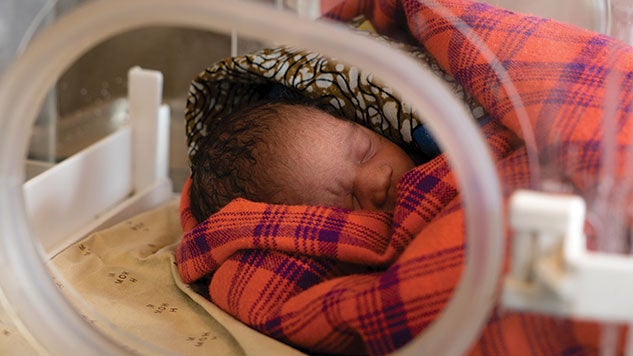 A baby in the Zomba nursery