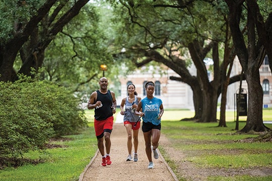A RUNNING START: President DesRoches, Paula DesRoches and daughter, Shelby ’23, go for a jog around the Inner Loop on his first day as president.