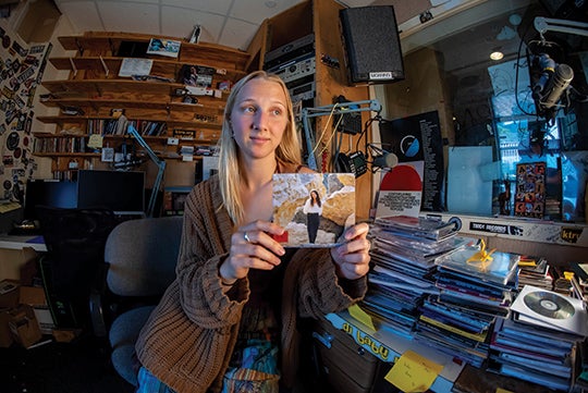 KTRU business manager Soleste Starr ’25 holds a copy of the CD “Solely” by Natalie Jane Hall.