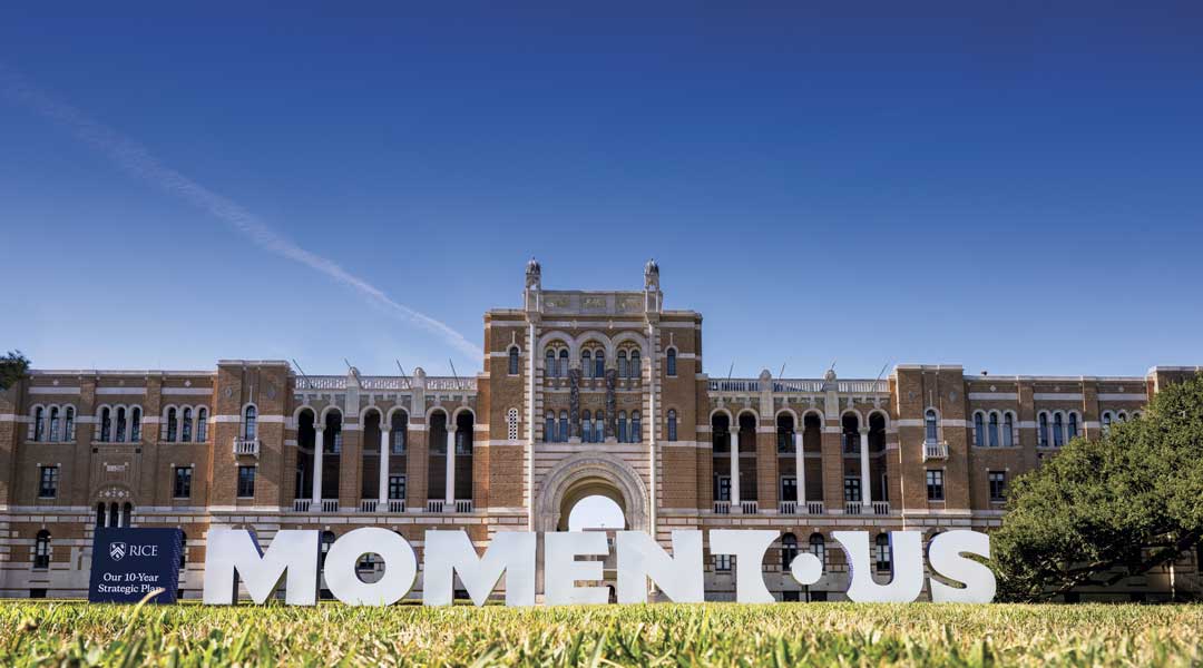Photo of Lovett hall with a temporary Momentous sign in the foreground