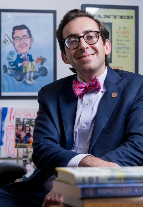 Photo of Evan Mintz in his office