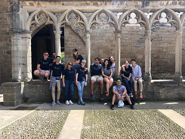 Professor Aymara Boggiano, our two student leaders, fellow Rice Owls and I relax outside the Church of Santa María before visiting the Royal Palace of Olite.