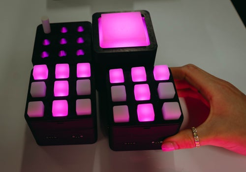 Close up of the interactive game with modular tiles that light up