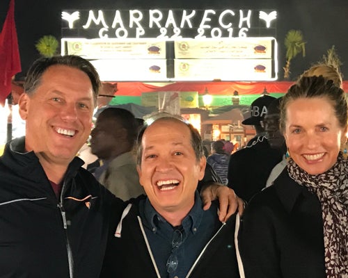 2016 photo of Andy Karsner flanked by Brad Powell and Laurene Jobs