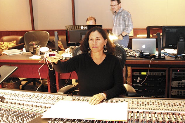 Franco at work on a movie in the Warner Bros. control room. Photo courtesy of Germaine Franco