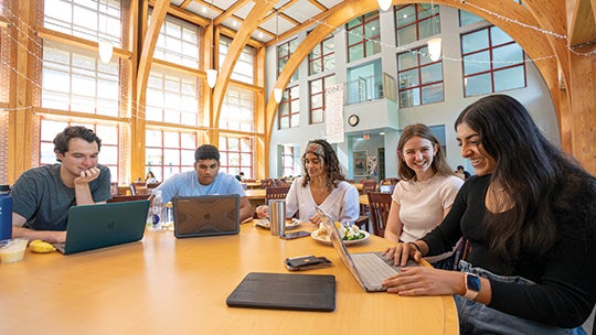 L-R: Nathan Powell, Ankit Patel, Devika Jhaveri, Casley Matthews and Esha Ghai study over lunch in the Martel Commons.