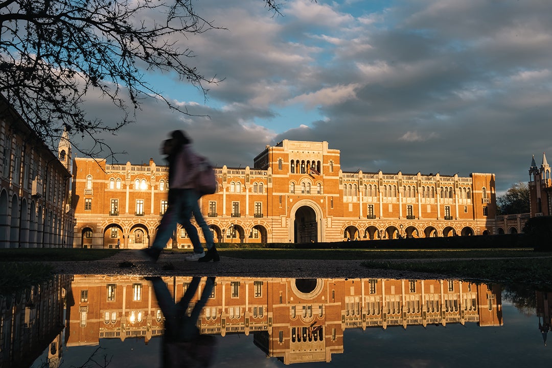 Lovett Hall mirrored in puddles of rain on the morning of Feb. 1, 2023