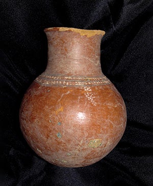 Items that have been returned to Mali include a high-necked polychrome pot.