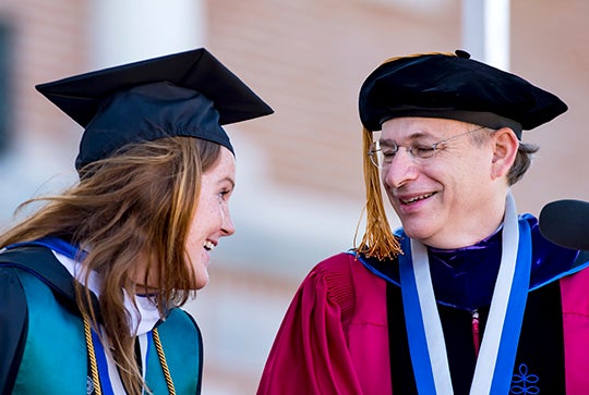 2014: The Academic Quad was always such a beautiful setting for commencement. I really like this shot of former President David Leebron. He was always his happiest when mingling with students. He knew how to speak to them, and they always seemed to enjoy his conversations.