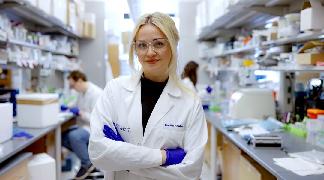 Photo of Martha Fowler in a lab setting