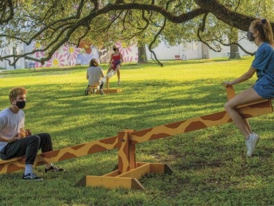 Students on see saw