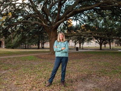 Rice Arborist Dawn Ellinger photographed near an oak tree on campus