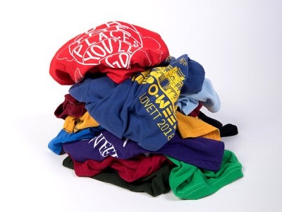 A pile of O-week tshirts