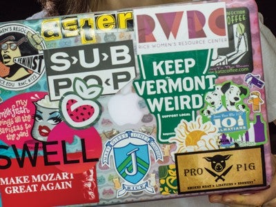 laptop covered in stickers