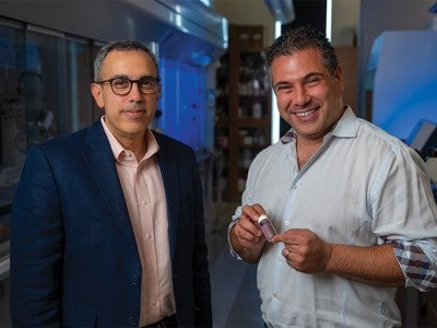 Omid Veiseh (right) and Amir Jazaeri in Veiseh’s Rice laboratory - photo