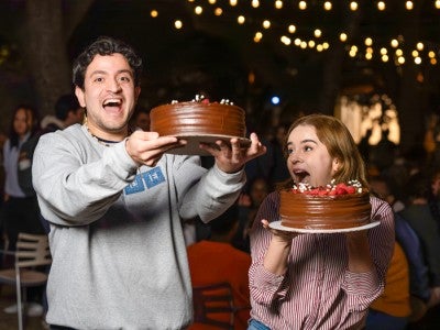 Graduate students rewarded with cake