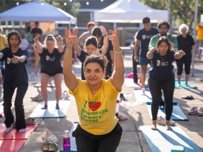Students doing yoga in Rio Grande