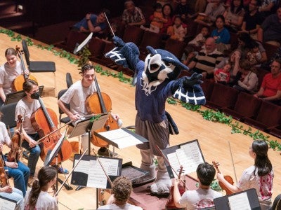 Sammy the Owl conducting