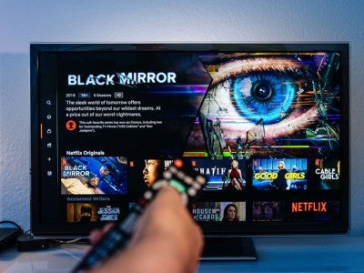 Photo of tv with Netflix's tv series Black Mirror displayed