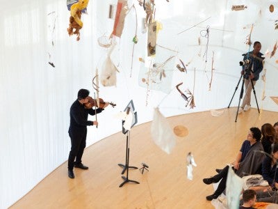 Violinist performing at Moody Center For The Arts