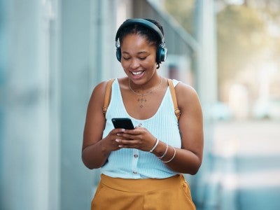 Photo of student listening to music